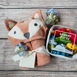 Fox-shaped baby blanket with a clear pouch of colorful toys