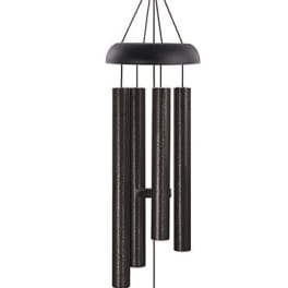 Black metal wind chime with hanging tubes and a clapper