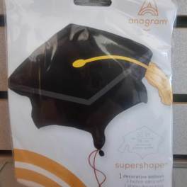 Packaged black graduation cap-shaped balloon with gold tassel