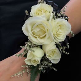 White rose wrist corsage with black ribbon