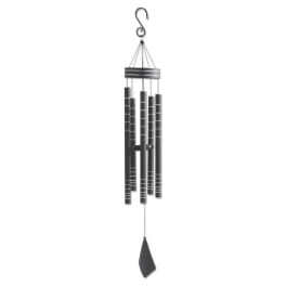 Black hanging wind chime with metal tubes and a clapper