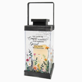 Decorative lantern with a sympathy message and small floral print