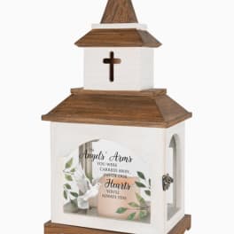 Wooden memorial lantern with a cross and angel graphic