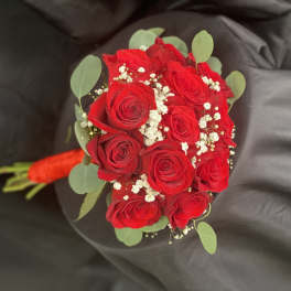 Bouquet of red roses with baby's breath and eucalyptus