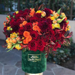 Signature emerald green box with fall bloom mix