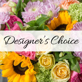 Mixed bouquet with sunflowers, roses, and chrysanthemums labeled Designer's Choice