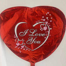 Red heart-shaped foil balloon with "I Love You" text