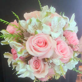 Pink roses and white alstroemeria bouquet with green accents