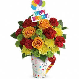 Birthday bouquet in a decorated cup with a Happy Birthday topper and balloons