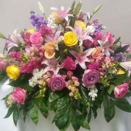 Large mixed bouquet of pink, yellow, and white flowers
