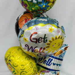 Stack of colorful get well balloons with smiley faces