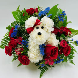 Dog-shaped floral arrangement with red roses and white carnations