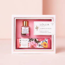 Rose-themed fragrance and hand cream gift set in a pink box