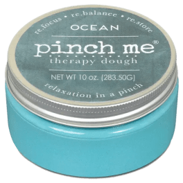 Blue jar of Pinch Me therapy dough with a metal lid