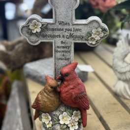 Decorative memorial cross with two birds and floral accents