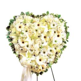 Heart-shaped white floral standing spray with ribbon