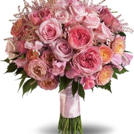 Pink rose bouquet with ribbon-wrapped stems