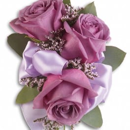 Lavender rose bouquet with satin ribbon and greenery