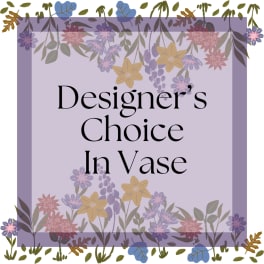 Lavender floral sign reading Designer's Choice In Vase
