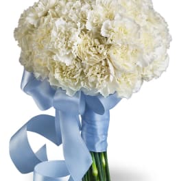 White carnation bouquet tied with a light blue ribbon
