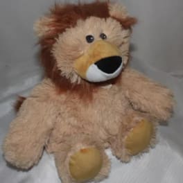Plush lion toy with tan fur and a brown mane
