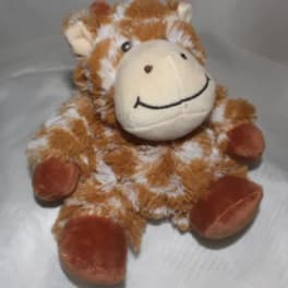Plush giraffe toy with a smiling face and brown-and-white fur