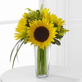 Sunflower bouquet in a clear glass vase