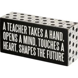 Decorative block with teacher quote in black and white