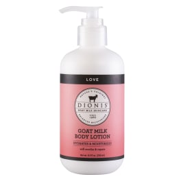 Pink bottle of goat milk body lotion with a pump dispenser
