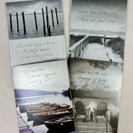 Four sympathy cards with grayscale lake and dock scenes and grief quotes