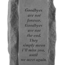 Rectangular memorial stone with engraved sympathy verse on rough rock background