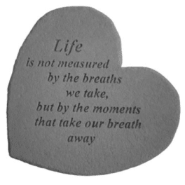Heart-shaped memorial plaque with a printed quote