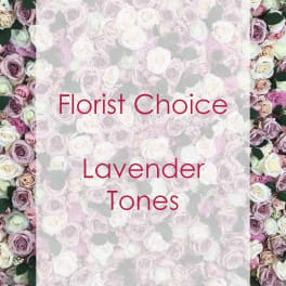 Florist choice lavender-toned rose arrangement with white roses