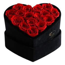 Heart-shaped box of red roses on a black base