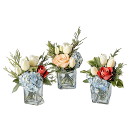 Three small floral arrangements in square glass vases with tulips, roses, and hydrangeas.