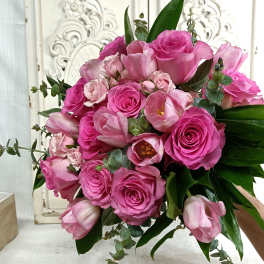Pink rose and tulip bouquet with eucalyptus greenery