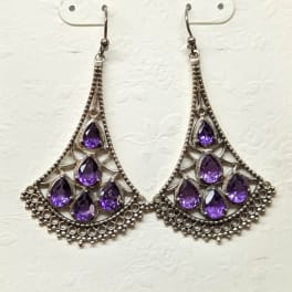 Pair of silver chandelier earrings with purple teardrop stones