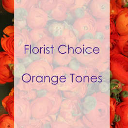 Orange ranunculus bouquet with a florist choice label