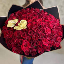 Large bouquet of red roses with two gold orchids