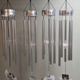 Four silver memorial wind chimes with hanging dove and heart ornaments