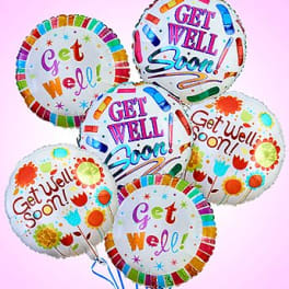 Cluster of colorful get well soon balloons on a pink background