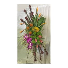 Tall tropical floral arrangement with purple orchids and orange bird-of-paradise