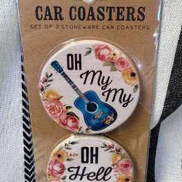 Packaged set of two round car coasters with floral guitar designs