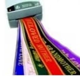 Ribbon spools with colorful printed satin ribbons