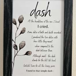 Framed memorial quote print with a simple floral branch illustration