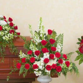 Casket spray, standing arrangement, and rose wreath in red and white
