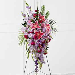 Tall standing floral spray with pink lilies and lavender flowers