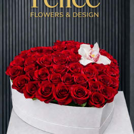Large box of red roses with a white orchid accent