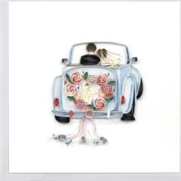 Paper-quilled Just Married car with pastel floral heart and trailing cans on a white greeting card.