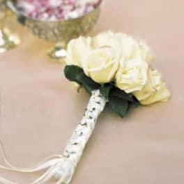 White rose boutonniere with ribbon-wrapped stem
